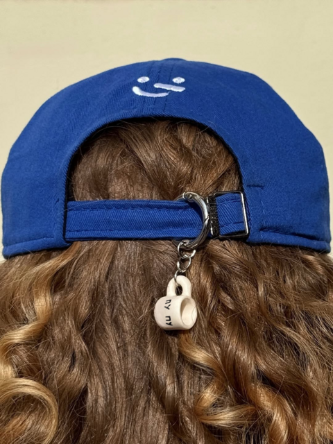 Ceramic micro pendant «Pu pu puuu» carabiner