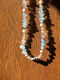 Shell necklace with ceramic bead