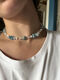 Shell necklace with ceramic bead