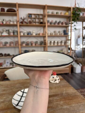 White plate with a colored rim