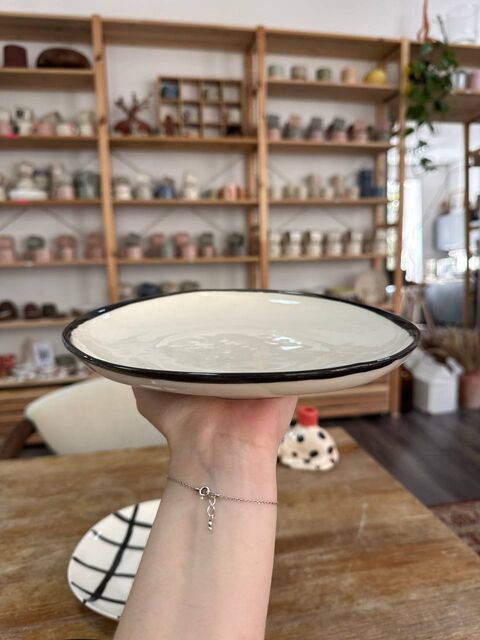 White plate with a colored rim