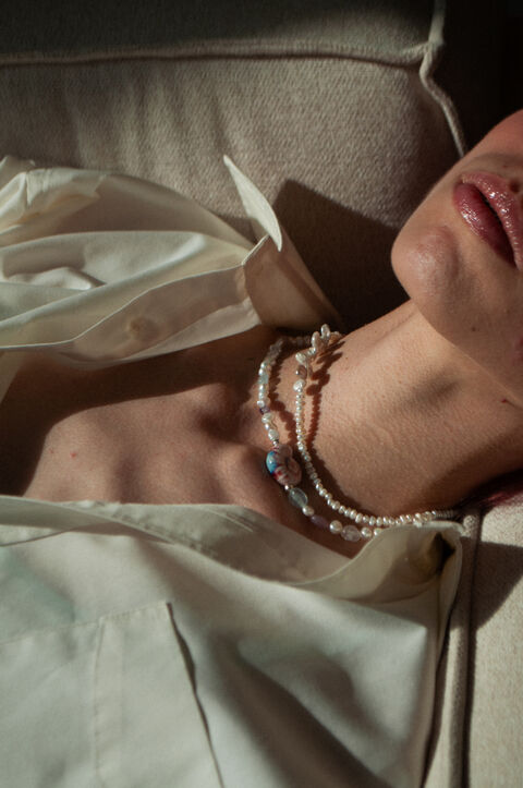 Pink necklace with ceramic bead