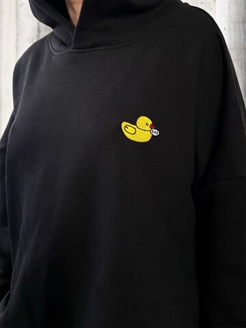 Black hoodie with “Duckling” embroidery