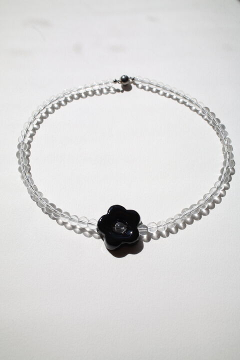 Choker Daisy with a black flower on a transparent base