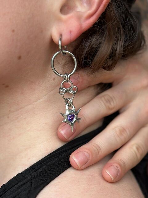Braided earrings with purple cubic zirconia
